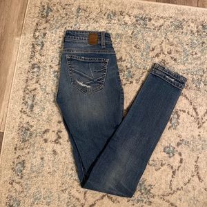 Buckle Skinny Jeans